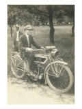 Black and White Photo of Man on Vintage Motorcycle