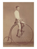 Photo of Man on Vintage Bicycle
