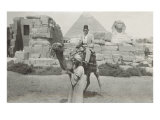 Man in Fez on Camel  Pyramid and Sphinx