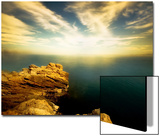 Sunlight Reflecting off Blue Waters off Cliffside