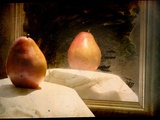 Pear against Framed Mirror