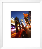 View of Times Square at Sunset with Illuminated Lights and Signs in New York City