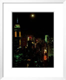The moon over the city lights of Hong Kong
