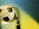 Goalie Holding a Soccer Ball