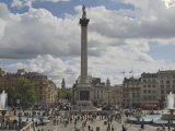 Nelsons Column in Trafalgar Square  with Big Ben in Distance  London  England  United Kingdom