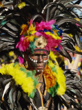 Man with Facial Decoration and Head-Dress with Feathers at Mardi Gras Carnival  Philippines