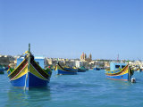 Painted Boats in the Harbour at Marsaxlokk  Malta  Mediterranean  Europe
