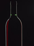 Backlit Shot of a Bottle of Red Wine
