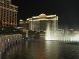 Bellagio Hotel in Forground with Caesar's Palace in Background at Night  Las Vegas  Nevada  USA