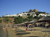 Beach Below the White Houses and Acropolis of Lindos Town  Rhodes  Dodecanese Islands  Greece