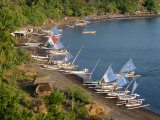 Outrigger Fishing Boats Line the Beach on the East Coast of Bali  on the Lombok Strait