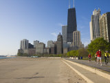 Joggers and Cyclists on Lake Michigan Shore  Oak Street Beach  Chicago  Illinois  USA