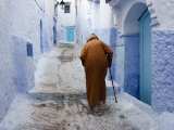 Old Man Walking in a Typical Street in Chefchaouen  Rif Mountains Region  Morocco