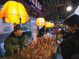 Street Market Selling Local Snacks and Sweet Hawthorne on Sticks  Daoliqu Area  China