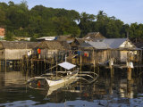 Stilt Houses and Catamaran Fishing Boat  Coron Town  Busuanga Island  Palawan Province  Philippines