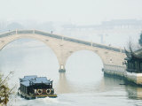Stone Arched Bridge on Waicheng River with Wumen Bridge Behind  Suzhou  Jiangsu Province  China