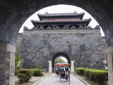 Tourist Rickshaw at a City Gate Watch Tower  Qufu City  Shandong Province  China