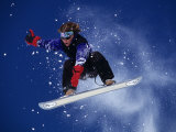 Young Male Snowboarder in Action