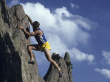Man Rock Climbing