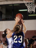 Female High School Basketball Players in Action During a Game