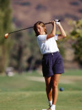 Woman Golfer in Action
