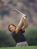 Woman Golfer in Action