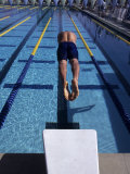 Swimmer Diving Off the Starting Blocks to Begin a Race