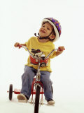 4 Year Old Boy Posing on His Tricycle  New York  New York  USA