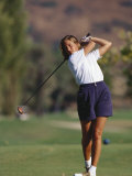 Woman Golfer in Action