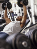 Male Working Out with Weights in a Health Club  Rutland  Vermont  USA