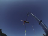 Pole Vaulter Flys over the Bar
