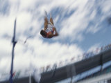 Pole Vaulter Flys over the Bar