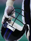 American Football Player Holding His Helmet