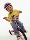 4 Year Old Boy Posing on His Tricycle  New York  New York  USA