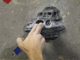Detail of Hand on Wall Climbing Grip