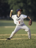 Young Boy Pitching During a Little League Baseball Games