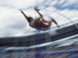 Pole Vaulter Flys over the Bar