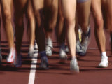 Blurred Action of Women Runners During a Track Race