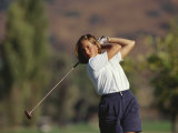 Woman Golfer in Action