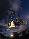 Bmx Cyclist Flys over the Vert