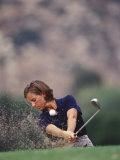 Woman Golfer in Action