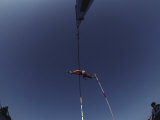 Pole Vaulter Flys over the Bar