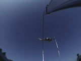 Pole Vaulter Flys over the Bar