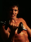 Man Working Out with Hand Weights