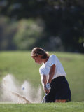 Woman Golfer in Action
