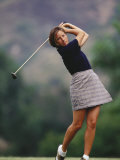 Woman Golfer in Action