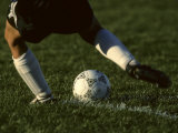 Detail of Foot About to Kick a Soccer Ball