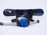 Female Snowboarder Collapsed after a Run  New York  USA