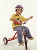 4 Year Old Boy Posing on His Tricycle  New York  New York  USA
