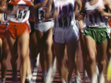 Blurred Action of Women Runners During a Track Race